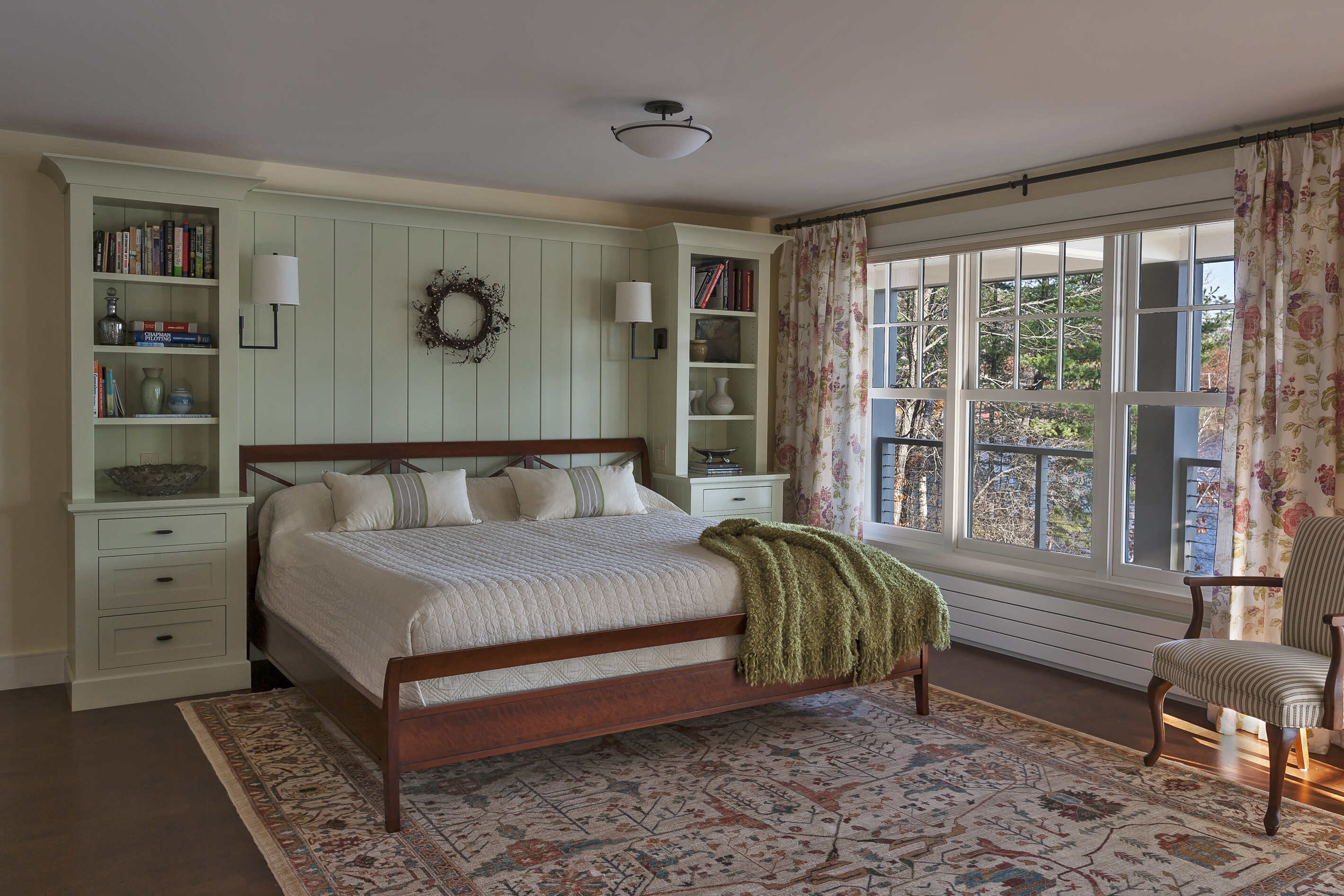 bedroom with windows and curtains