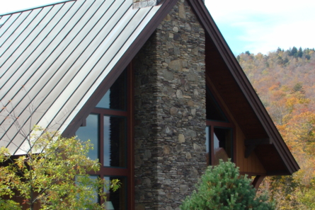 roof of lodge and stone chimney