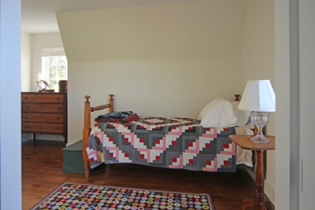 twin sized bed in land barn bedroom